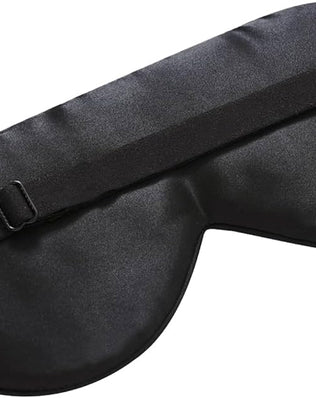 Organic silk sleep mask by Problems Solved with soft padding and lightweight design for smooth skin and restful sleep.