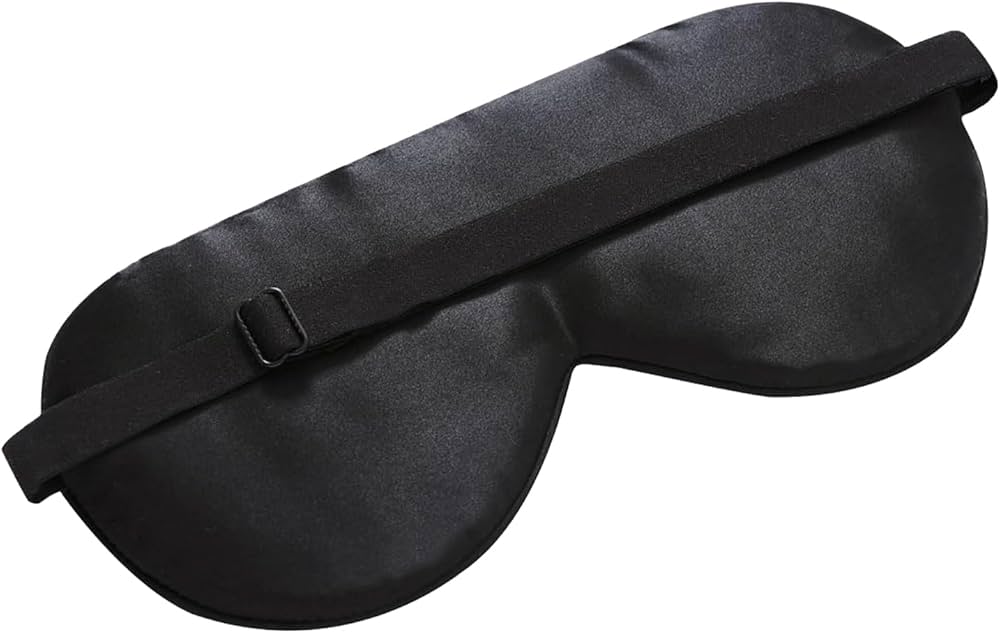 Organic silk sleep mask by Problems Solved with soft padding and lightweight design for smooth skin and restful sleep.