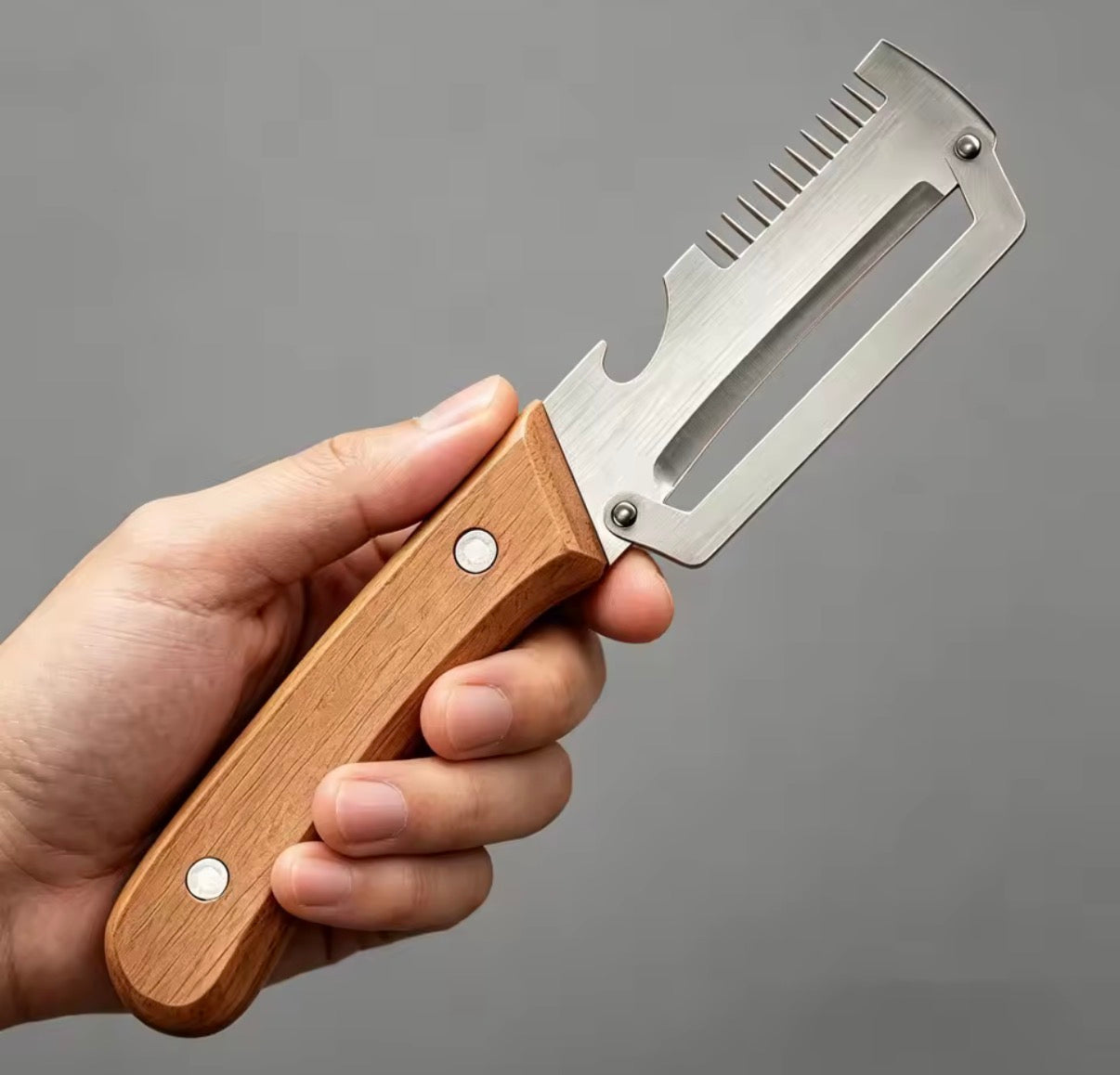 Problems Solved wooden vegetable peeler with ergonomic handle, showcasing a sharp peeling blade and comfortable grip for peeling tasks.