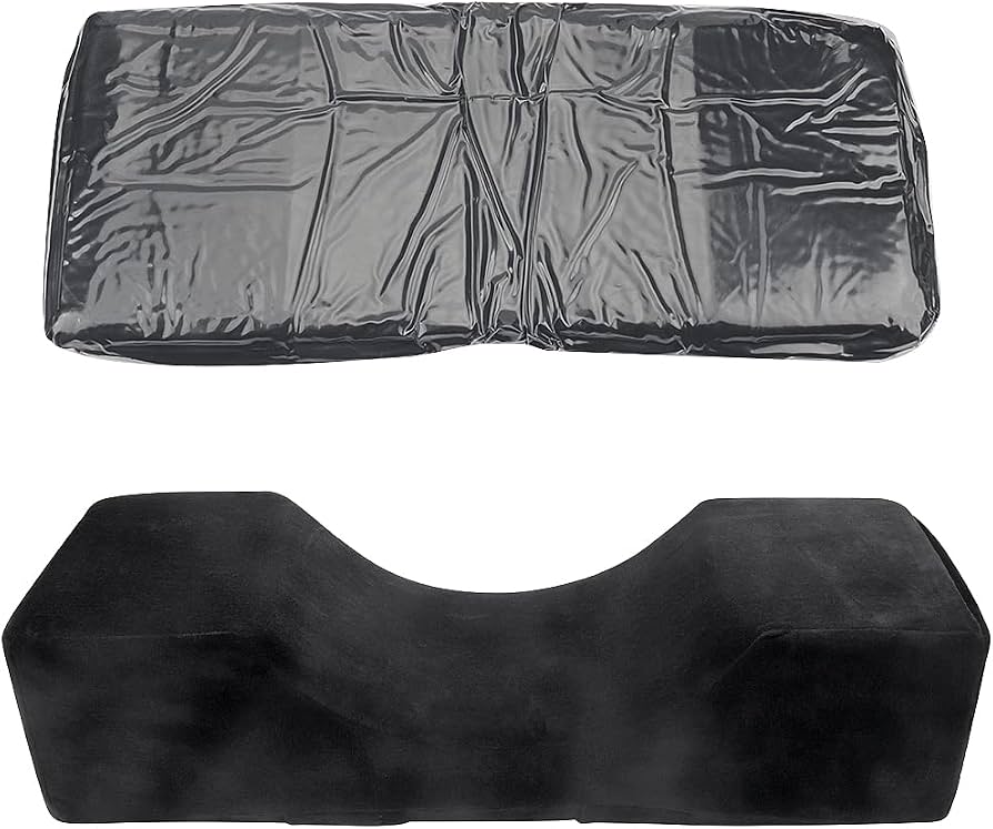 Black velvet eyelash extension pillow by Problems Solved, featuring memory foam neck support for beauty salon eyelash application.