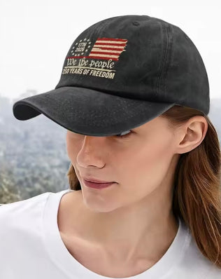 Retro washed printed U.S. 250th anniversary baseball hat by Problems Solved, featuring vintage design and embroidered details.