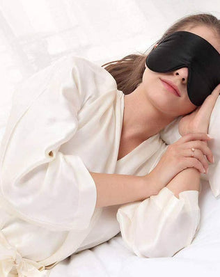 Organic silk sleep mask with soft padding, lightweight design, ideal for smooth skin care and restful sleep by Problems Solved.