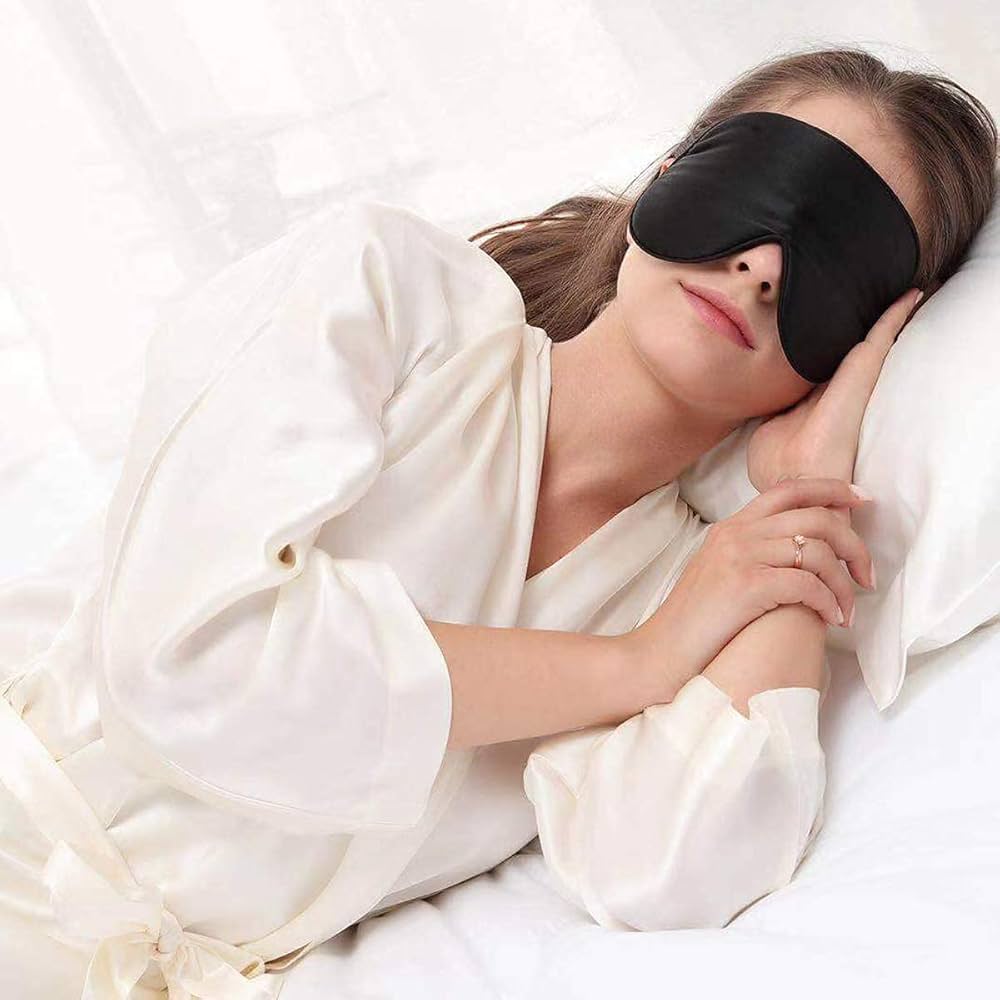 Organic silk sleep mask with soft padding, lightweight design, ideal for smooth skin care and restful sleep by Problems Solved.