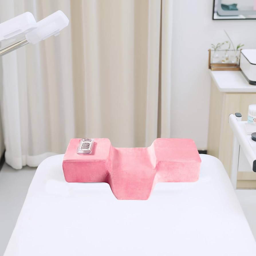 Memory foam eyelash extension pillow by Problems Solved designed for beauty salons, provides neck support during eyelash extension treatments.