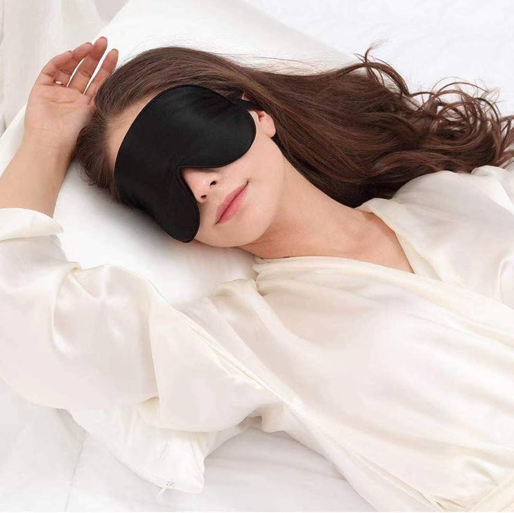 Organic silk sleep mask by Problems Solved with soft padding and lightweight design, perfect for smooth skin and restful sleep.