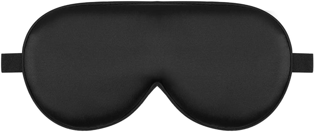 Organic silk sleep mask by Problems Solved with soft padding, lightweight design, and smooth texture for comfortable skin care.