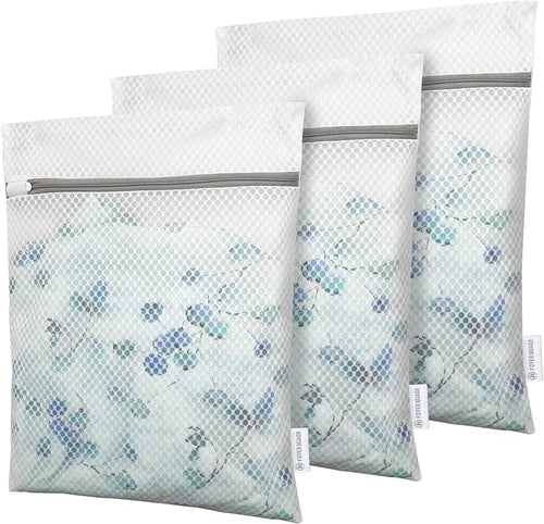 Three mesh laundry bags with zippers for delicates and socks, small washing bags by Problems Solved displayed in the image.