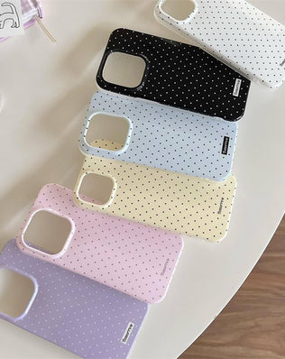 Problems Solved Reownest iPhone 13/14 case with cute polka dot pattern and aesthetic design, showing the colorful, patterned phone cover.