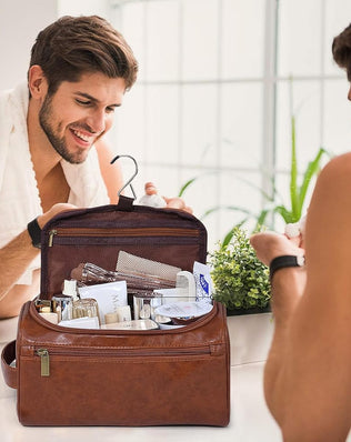 Dark brown leather toiletry bag for men by Problems Solved, ideal for travel, gym, and shaving essentials.