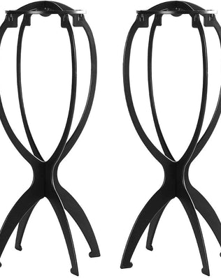 Two Problems Solved wig stands for short wigs, featuring mannequin heads with realistic facial features and adjustable stands.