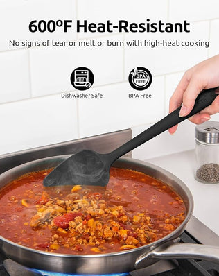 Set of four Problems Solved silicone spatulas, heat-resistant up to 315°C, flexible and ideal for cooking and baking tasks.