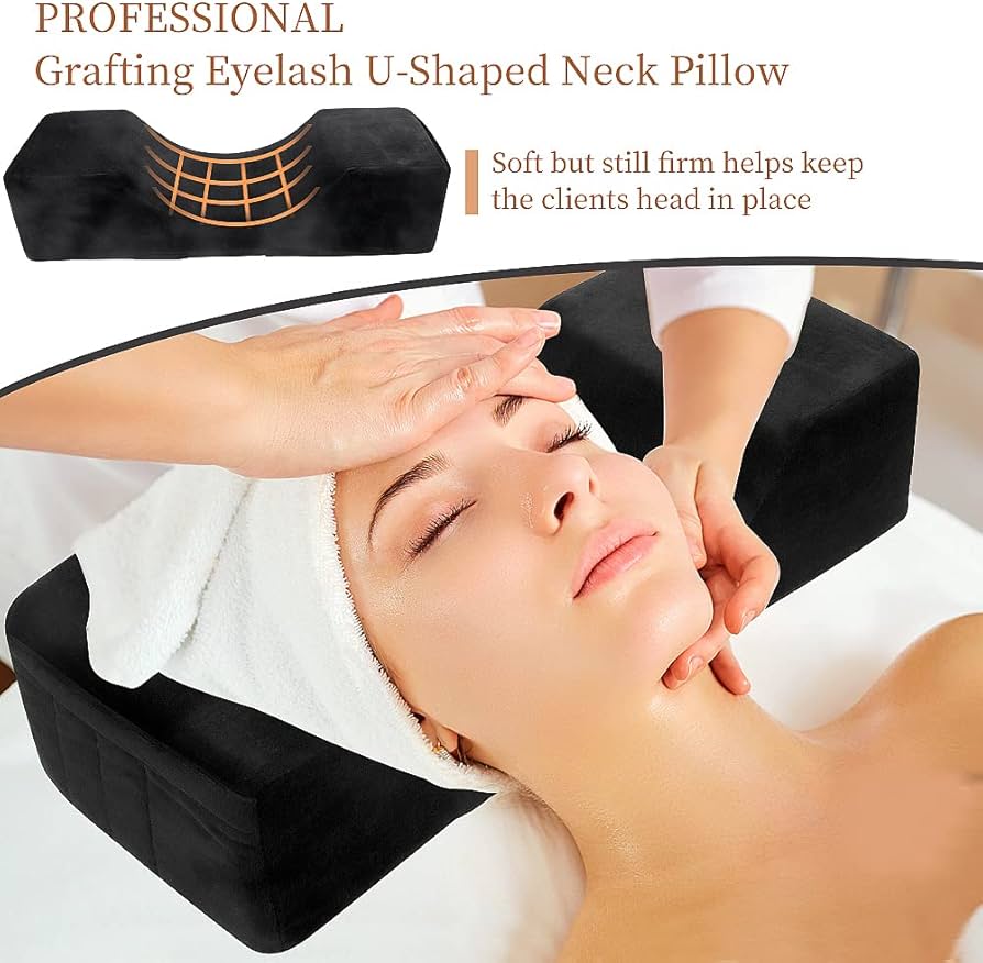 Black velvet eyelash extension pillow by Problems Solved with memory foam neck support for salon comfort and eyelash application.