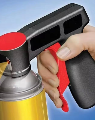 Plastic portable spray paint handle by Problems Solved, reusable and universal, shown attached to a spray paint can.