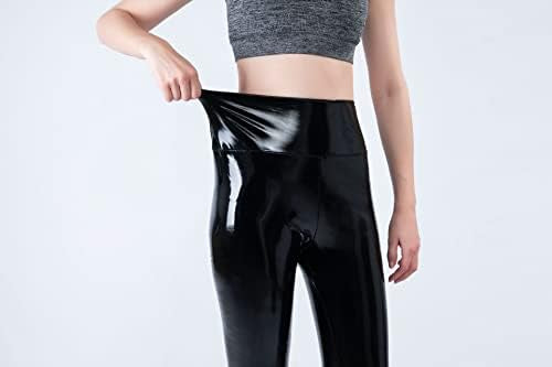 Women mirror faux patent leather leggings by Problems Solved with shiny, reflective stretch fabric, shown on a model.