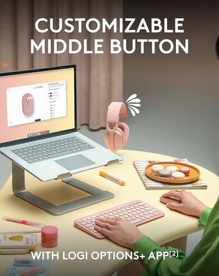 Logitech Pebble 2 M350s wireless Bluetooth mouse from Problems Solved, slim, portable, lightweight design on a neutral surface.
