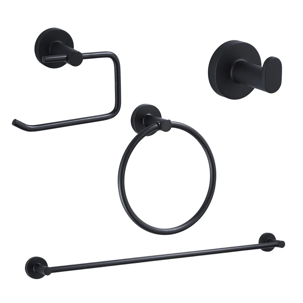 Problems Solved black bathroom hardware with robe hook, towel rail, bar rack, shelf, and tissue paper holder on a bathroom wall.