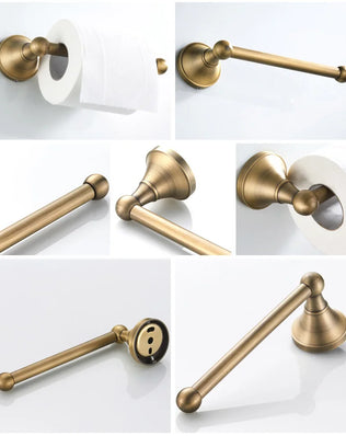 Antique brass wall-mounted toilet paper holder from Problems Solved, designed for bathroom accessories with a vintage style.