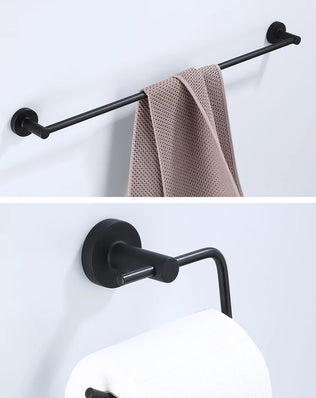 Black bathroom hardware set including robe hook, towel rail, bar rack, shelf, and tissue paper holder by Problems Solved
